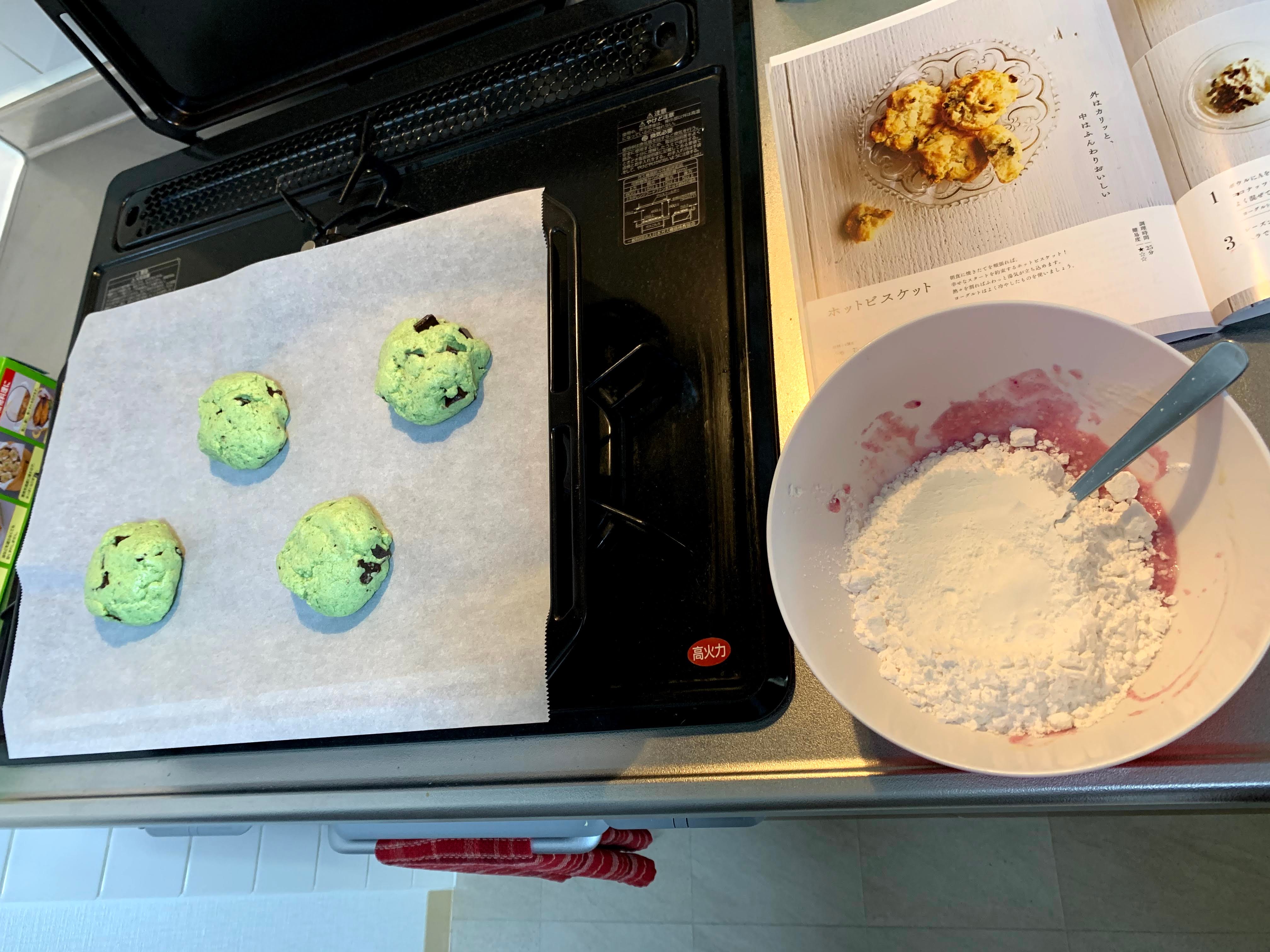 baking sheet with green biscuits
