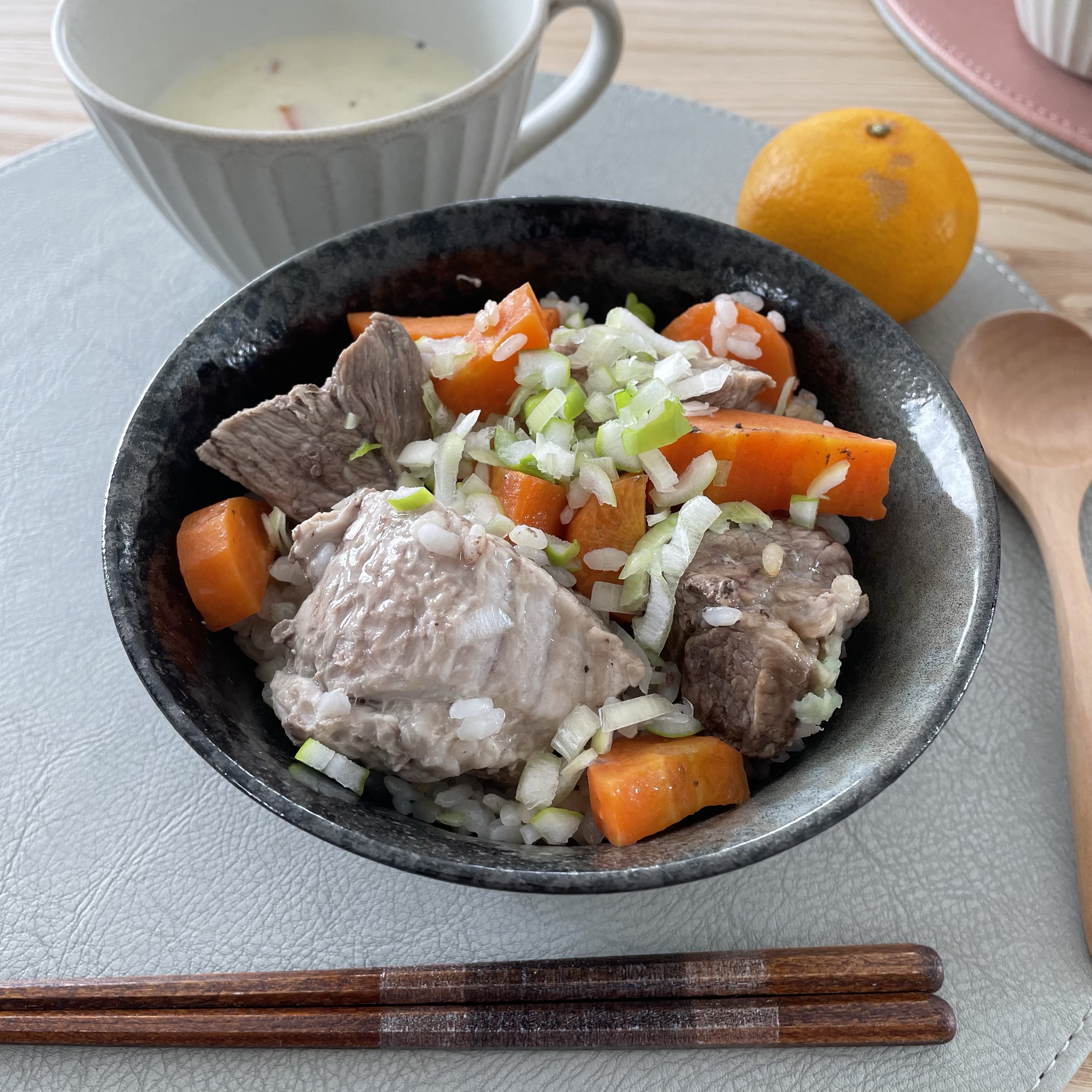 Pork and rice cooked in a pressure cooker together